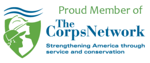 The corps network logo with the words'proud member of the corps network'.