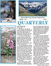 A quarterly magazine with pictures of a mountain and a blue bird.