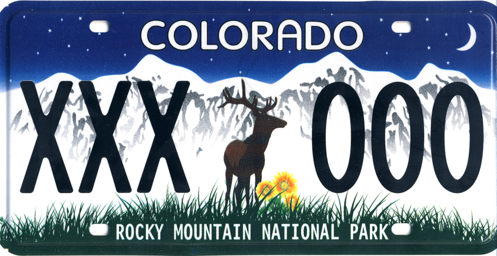 Colorado license plate with a deer and mountains.