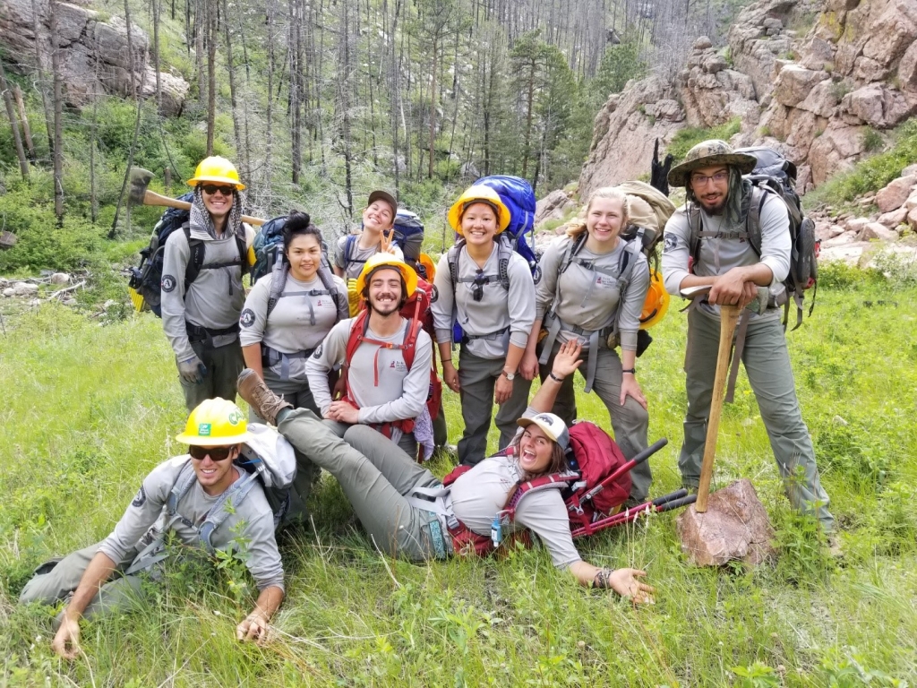 A group of hikers posing for a photo.