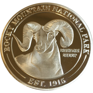 A collectible coin with a ram on it.