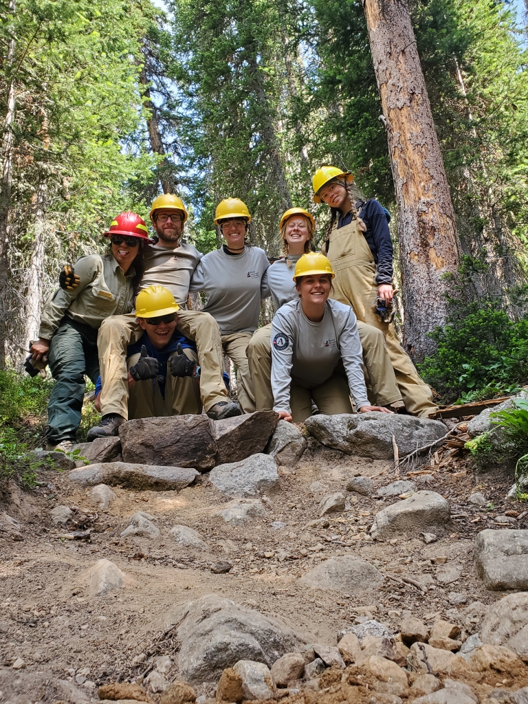 Group of workers posing for a picture