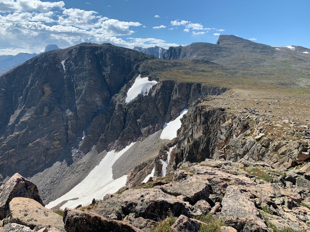 Rugged mountain landscape with patches of snow