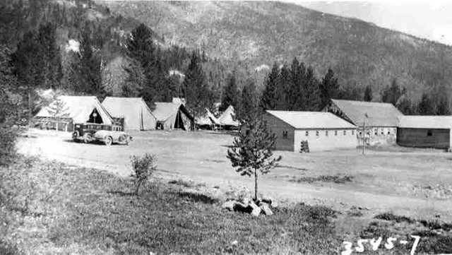 A black and white photo of a mountain village.
