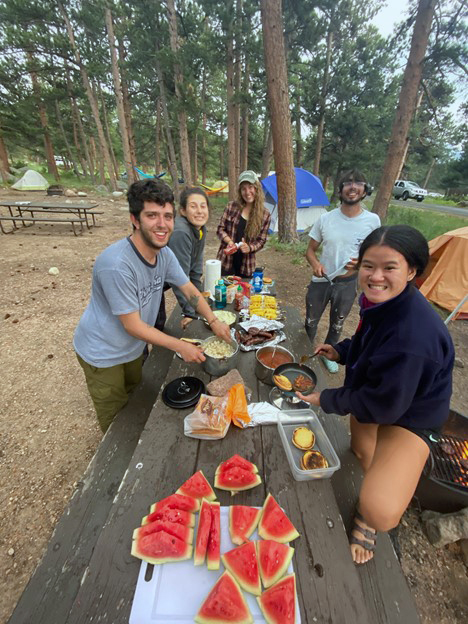 People having meal in the forest