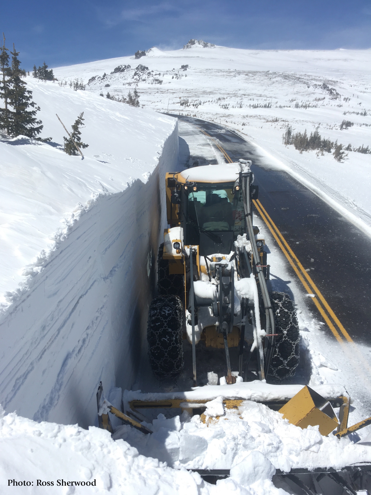 Vehicle plowing snow