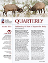 The cover of the quarterly magazine with two elk standing next to each other.