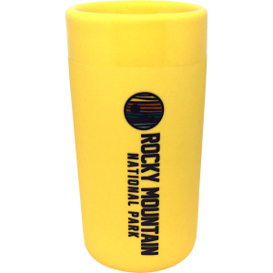 A yellow shot glass with the word rocky mountain on it.