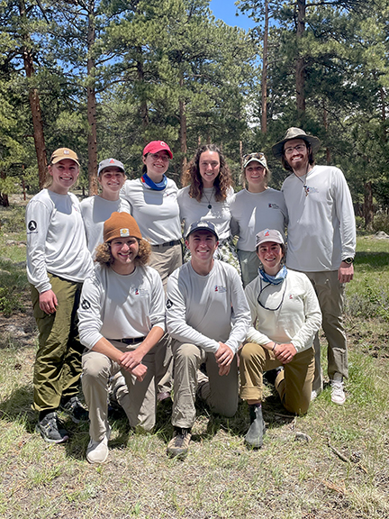 2022 crew leaders in a forest