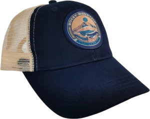 A Ornate Navy Trucker with a patch on it.