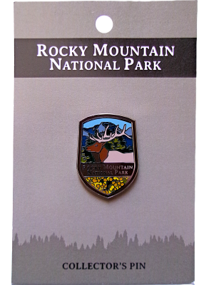 Rocky Mountain National Park collector's pin called "Pin - RMNP Elk," showcasing an elk and mountain scene on a display card.