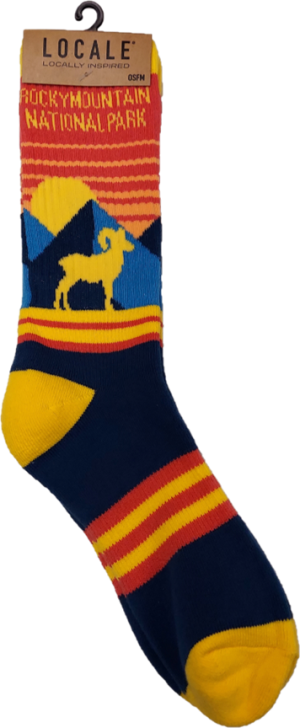 Colorful sock featuring yellow and red mountain scenes, with a yellow ram silhouette and "Rocky Mountain National Park" text. Brand tag "Locale Locally Inspired" attached. Product Name: Socks - RMNP Yellow Ram