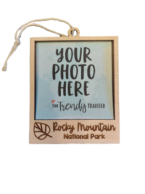 Ornament - Wooden Picture Frame with Aspen Leaf, featuring a string for hanging and labeled "Rocky Mountain National Park," displays the placeholder text "YOUR PHOTO HERE" with "The Trendy Traveler" branding.