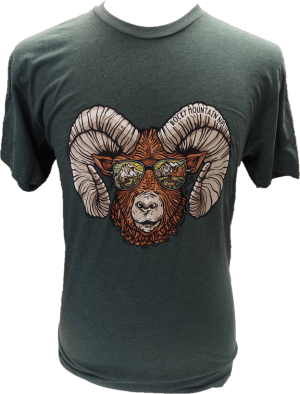 Green T-Shirt - RMNP Ram Sunglasses featuring a detailed illustration of a ram with large curved horns wearing sunglasses, and the text "Rocky Mountain Park" above one horn.