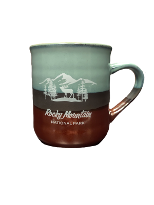 Product Description: A "Mug - RMNP Mod Collage (Copy)" ceramic mug showcasing the text "Rocky Mountain National Park" alongside an image of mountains, trees, and an elk set against a green and brown backdrop.