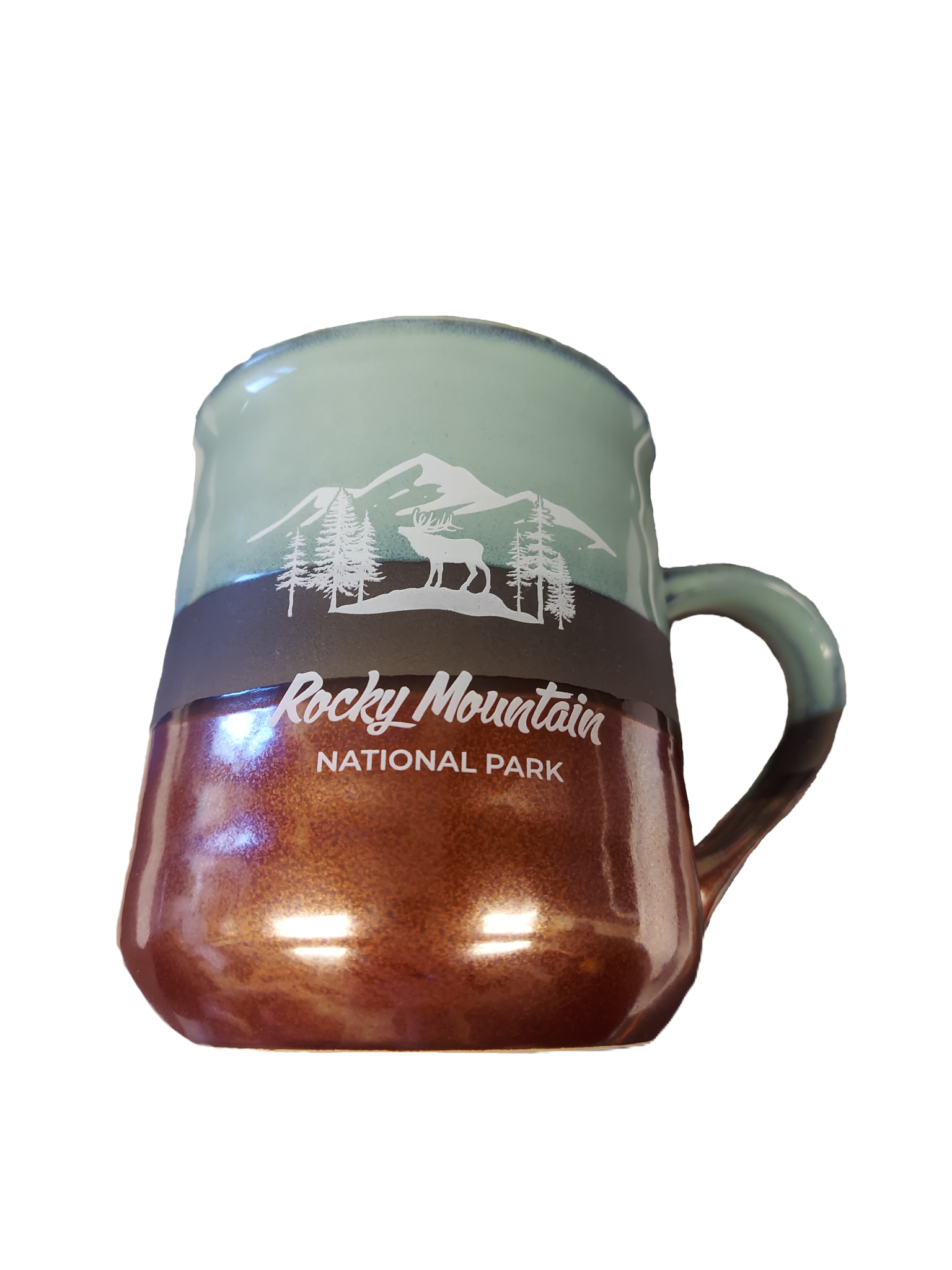 A green and brown mug with the Rocky Mountain National Park emblem, showcasing a design of mountains, trees, and a moose, known as the RMNP Copper Bottom Mug.