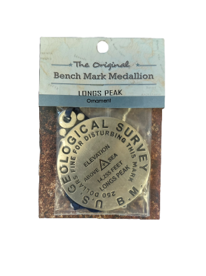 A packaged Ornament - Longs Peak Summit Marker reads: "U.S. Geological Survey, fine for disturbing this mark, elevation above sea 14,255 feet, Longs Peak, 2020.