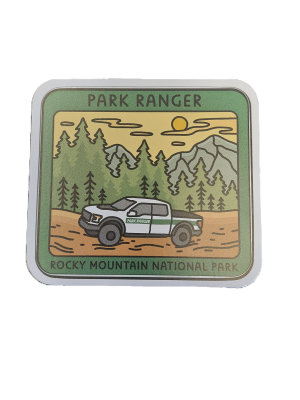 The Sticker - RMNP Park Ranger Truck features a park ranger truck set against mountains and trees, with the text "Park Ranger" and "Rocky Mountain National Park.